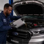 Technicien AC Ries effectuant vidange Ford prix Djibouti